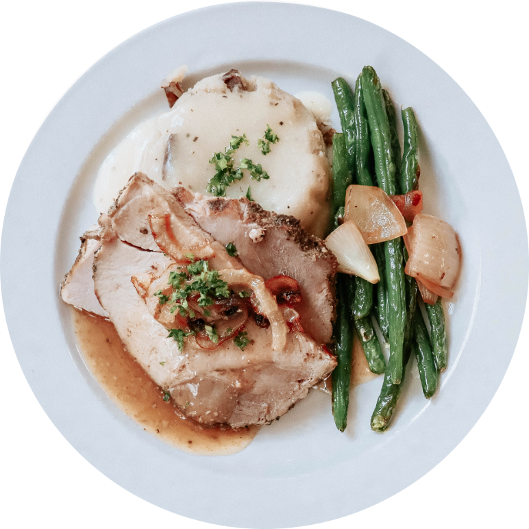 Plate of cooked meat and beans