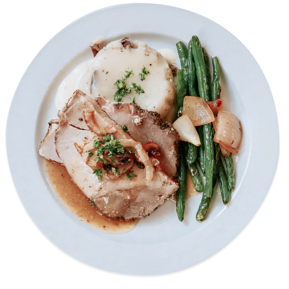 Kitchen West turkey lunch with green beans and mashed potatoes